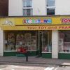 Storktown toymaster Logó