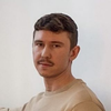 Tommi Toikkanen Logó